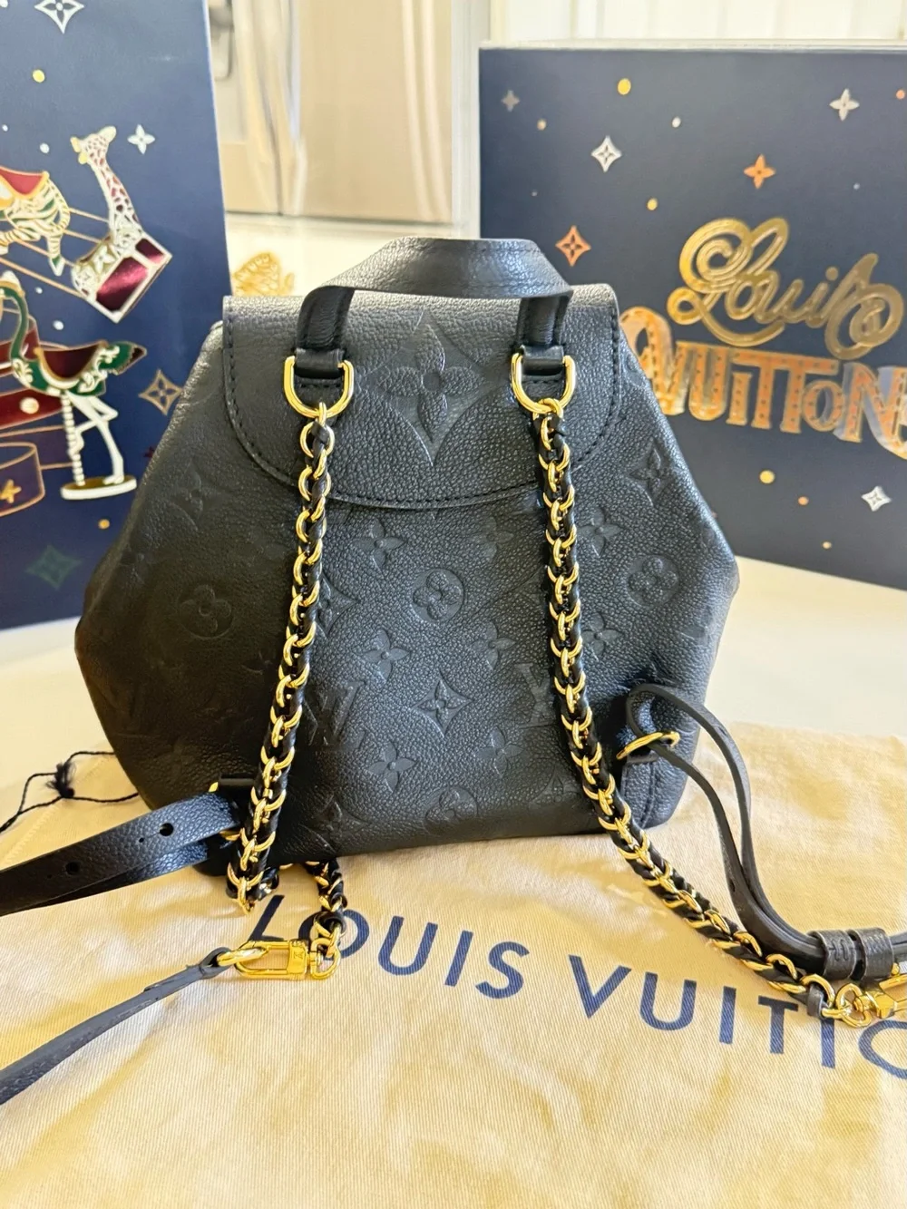 Louis Vuitton Black Monogram Embossed Leather Backpack with Gold Chain Straps